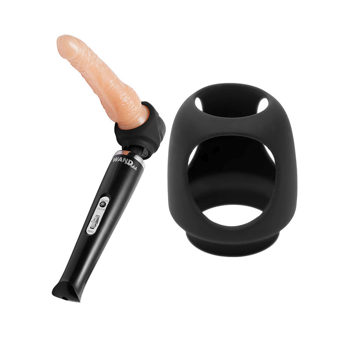 The Wand Essentials Silicone Strap Cap Wand Harness for Dildos, shown in black beside a premium silicone sleeve on a white background, offers versatile hands-free pleasure when used with your favorite handheld wand massager.