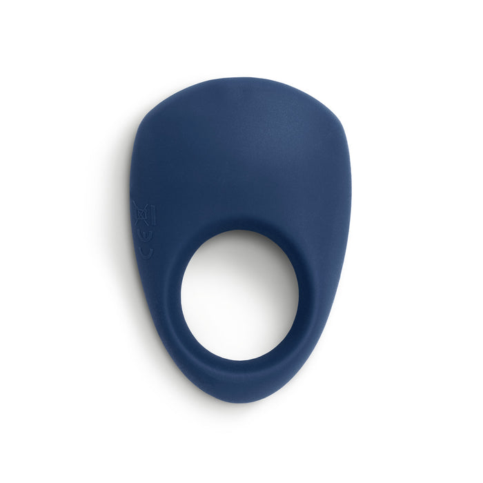 The We-Vibe Pivot Vibrating Silicone Rechargeable Penis Ring is a navy blue ring with a flat, oval top for clitoral stimulation and a circular opening at the bottom, shown against a white background.