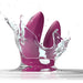 A dusty pink, egg-shaped We-Vibe Sync Remote and App Controlled Wearable Couples Vibrator by We-Vibe is partially submerged in water, creating a splash effect. The couples' vibrator appears to be waterproof and has a smooth and sleek design against a completely white background.