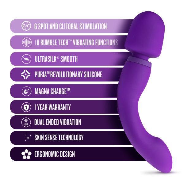 Image of a purple Wellness Dual Sense Double Ended Ergonomic Waterproof Wand by Blush with text listing its features: “G Spot and Clitoral Stimulation, 10 Rumble Tech Vibrating Functions, Ultrasilk Smooth, Puria Revolutionary Silicone, Magna Charge, 1 Year Warranty, Dual Ended Vibration, Skin Sense Technology, Ergonomic Design.”