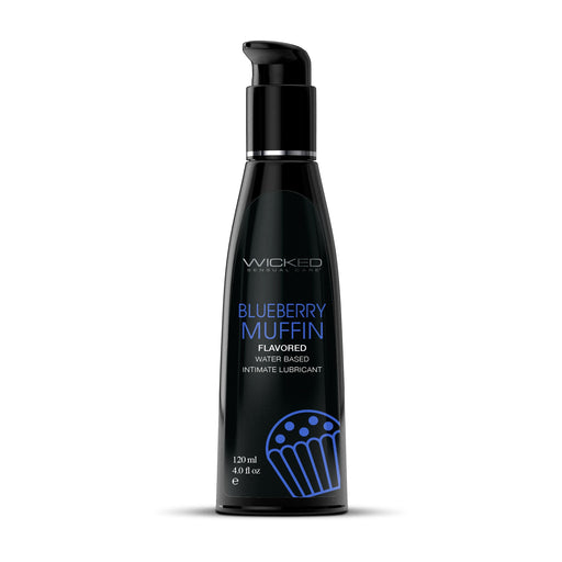 A 4 oz bottle of Wicked Aqua Blueberry Muffin Flavored Water Based Lubricant by Wicked Lubes offers delightful oral pleasures. This water-based lube comes in a sleek black bottle with a pump dispenser, adorned with blue and white text and graphics, including a stylish image of a blueberry muffin.