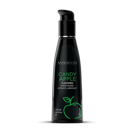 A black bottle labeled "Wicked Aqua Candy Apple Flavored Water Based Lubricant 4 oz" from the brand Wicked Lubes is shown. The bottle features a pump dispenser and an illustration of a green apple on the lower part. It contains 120 ml (4.0 fl oz) of the product.