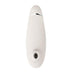 A sleek, warm gray electronic device with a smooth, elongated oval shape, the Womanizer Premium 2 Pleasure Air Clitoral Stimulator from Womanizer features a small, circular opening at one end with a silver accent near the top. Utilizing innovative Pleasure Air technology, its minimalist and modern design ensures optimal satisfaction.