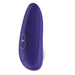The Womanizer Starlet 3 Pleasure Air Clitoral Stimulator in Indigo is a sophisticated handheld electronic device with an elegant curved design, featuring two control buttons and a small LED indicator. It includes a white circular attachment at the bottom for clitoral stimulation, delivering specific functionality. This product is ideal for individuals seeking an innovative experience with Pleasure Air Technology.