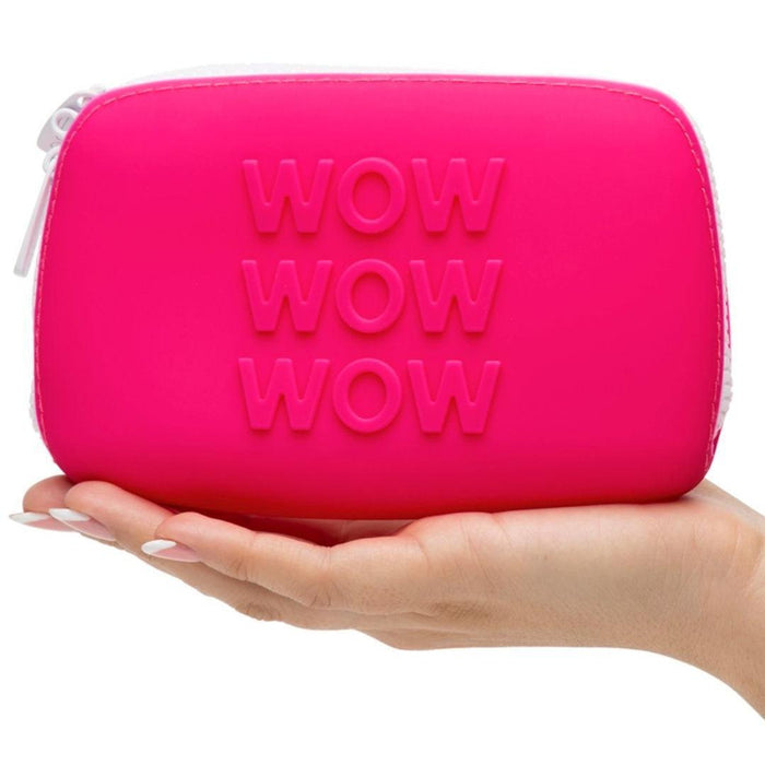 Happy Rabbit WOW Small Silicone Zipper Storage Case - Pink being held in a hand