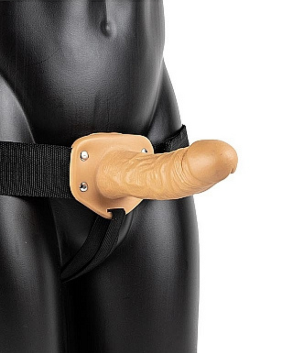 Caramel Realrock 6 Inch Hollow Dildo & Strap-on Harness on a black mannequin on a white background