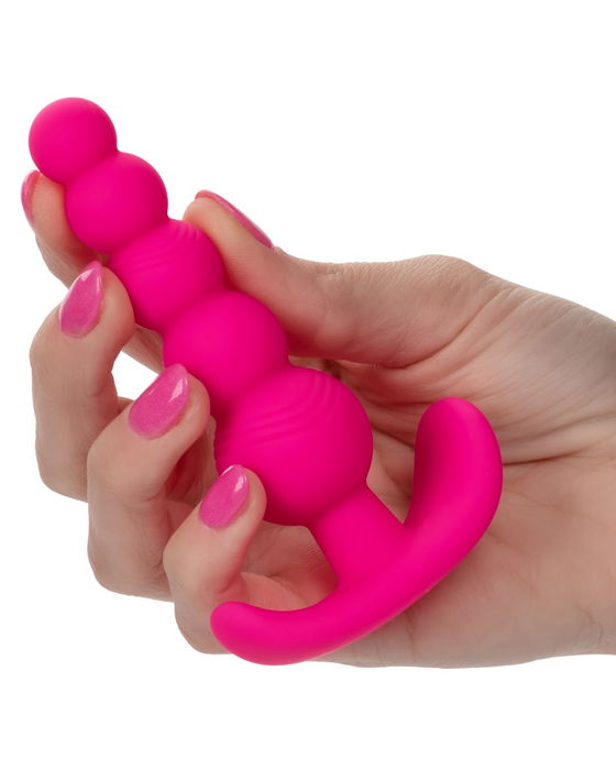 Cheeky X-5 Beads - Pink held in hand