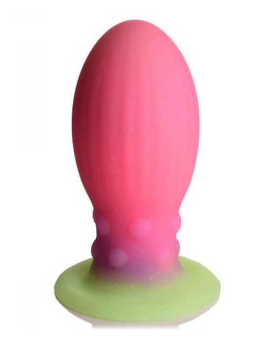 Xeno Egg Glow In The Dark Silicone Egg standing upright on a white background showing texture
