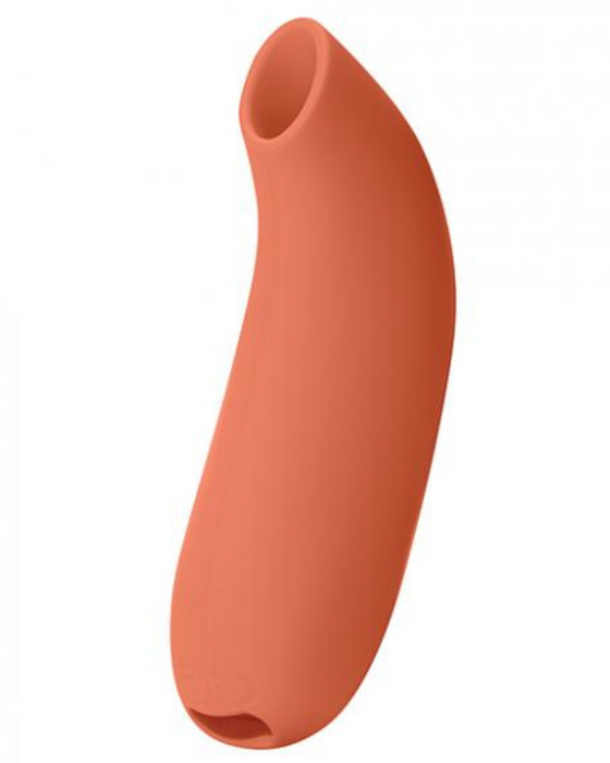Dame Aer Clitoral Pressure Wave Vibrator - Papaya alone on a white background showing pressure wave opening