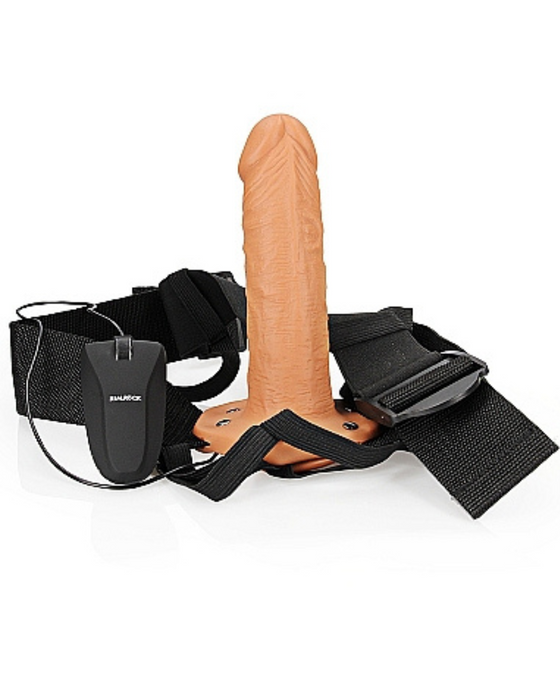 Realrock Vibrating 6 Inch Hollow Dildo & Strap-on Harness all together standing upward on a white background