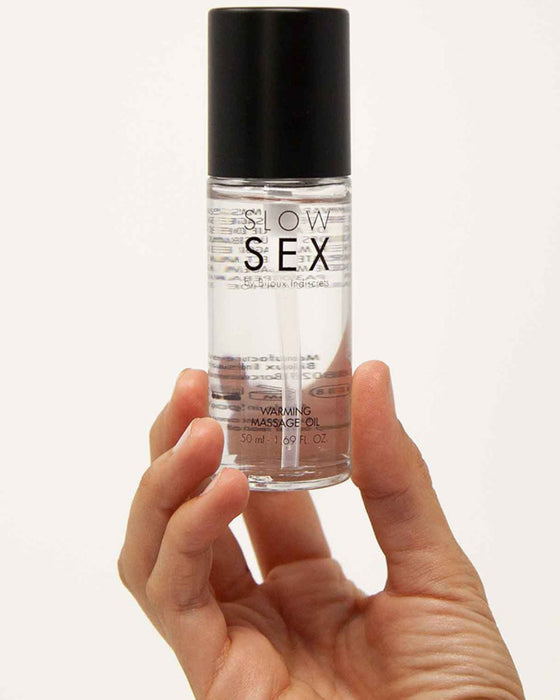 Bijoux Indiscrets Slow Sex Warming Massage Gel Model holding it 