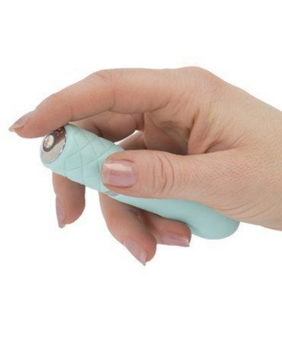 Pillow Talk Flirty Bullet Vibrator - Blue by BMS Products in hand