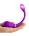 Ohmibod Esca 2 Interactive Bluetooth Internal G-Spot Vibrator held in a person's hand with the external end lit