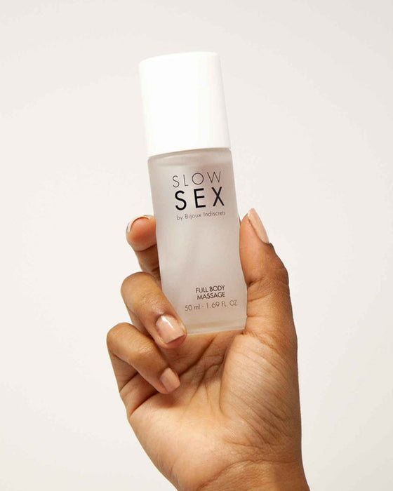 Bijoux Indiscrets Slow Sex Full Body Massage Gel Model's hand holding product