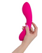 Swan Wand Powerful Double Ended Vibrator - Pink held in a person's hand by the shaft