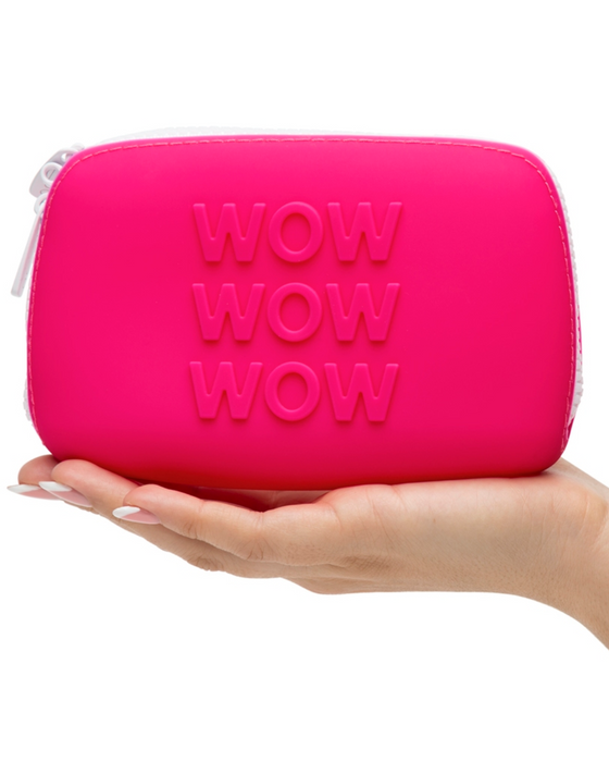 Happy Rabbit WOW Small Silicone Zipper Storage Case - Pink being held in a hand