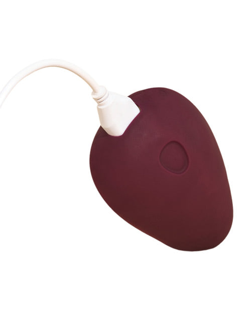 Pom Hand Held Flexible Silicone Vibrator by Dame Products - Plum with the charging cord