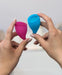 Fun Factory Fun Cup Size A Silicone Menstrual Cups held in a woman's hands