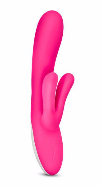 Hop Lola Bunny Silicone Dual Stimulation Rabbit Vibrator by Blush Novelties  hot pink against a white background with a side view of the shaft 