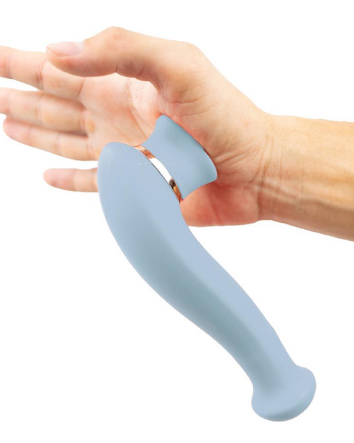 Destiny Blue Sucking Clitoral Stimulator suctioned to a person's palm