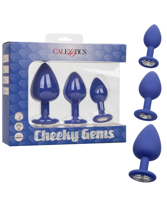 Cheeky Gems 3 Piece Silicone Butt Plug with Gemstone Set - Purple next to product box 