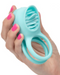 French Kiss Enhancer Silicone Vibrating Cock Ring held in model's hand 