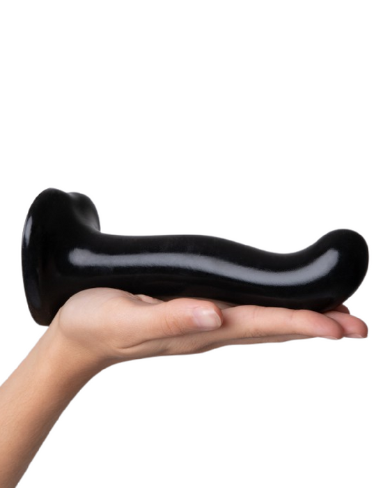 Strap-on-Me Extra Large 8 Inch Prostate & G-Spot Dildo held in a palm with the tip facing up