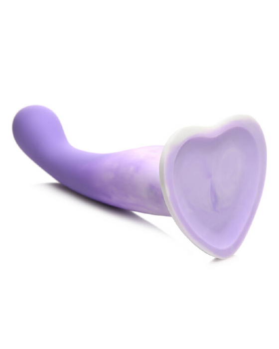 Simply Sweet 7 Inch Slim G-Spot Dildo with Heart Base laying down showing heart base 