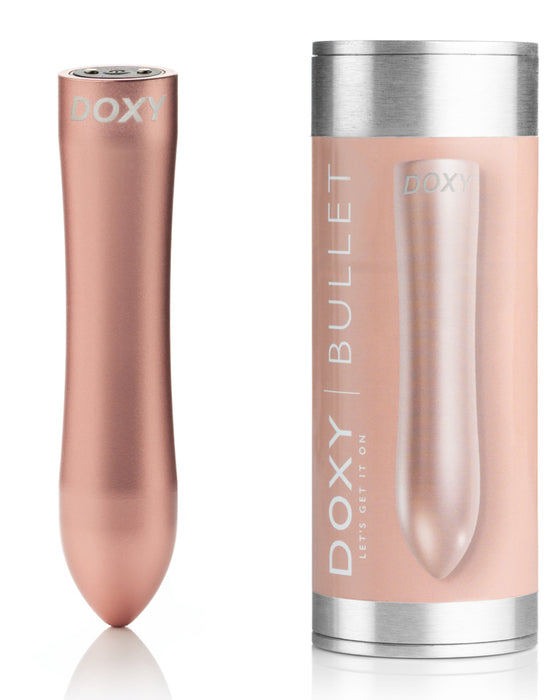 Doxy Ultra Powerful Whisper Quiet Bullet Vibrator - Rose Gold next to product box 