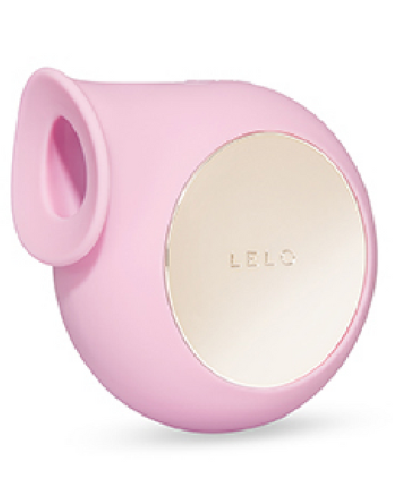 LELO Sila Pressure Wave Clitoral Stimulator - Pink against a white background side view