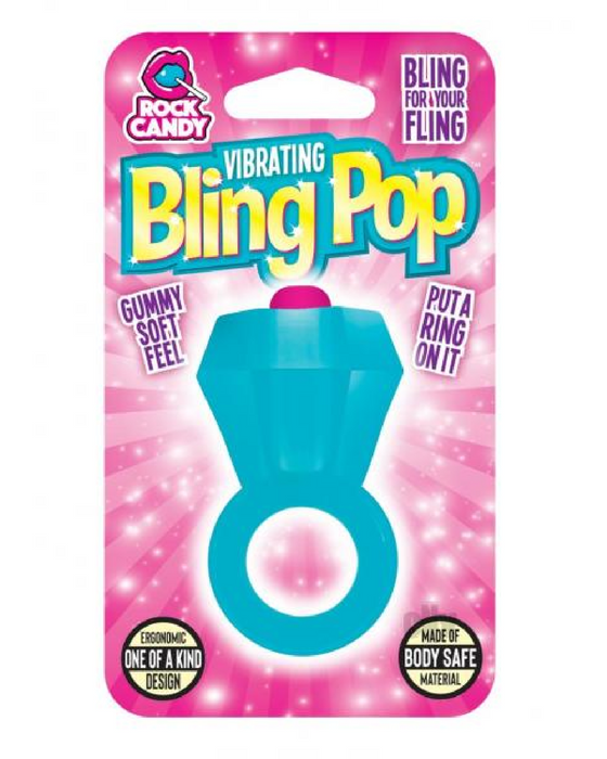 A colorful package for a Bling Pop Beginner's Blue Vibrating Cock Ring styled like a ring pop candy, a novelty adult toy with features such as a "gummy soft feel" and "body safe material" designed for clitoral stimulation, from the brand Rock Candy.