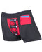 A pair of black Spareparts Tomboii Packing Boxer Briefs equipped with a red utility strap, including packing strap and mini-vibe pockets, to hold small items and a beverage can, designed for convenience and hands-free fun.