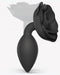 Open Roses Large Silicone Anal Plug - Black showing that it's pliable 