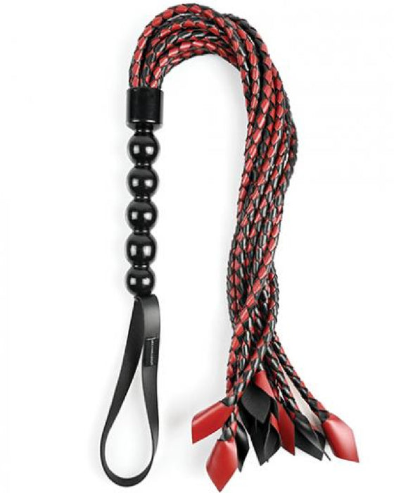 Saffron Braided Flogger by Sportsheets  looped on its side with a white background 