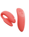 We-Vibe Chorus Remote & App Controlled Couples' Vibrator - Crave Coral on a white background with remote