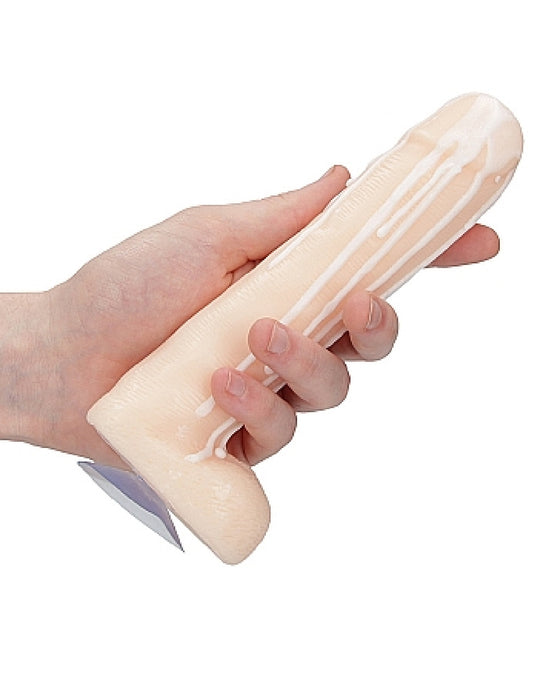 Dicky Soap With Balls - Cum Covered Novelty Soap (Vanilla Colored) held in a hand