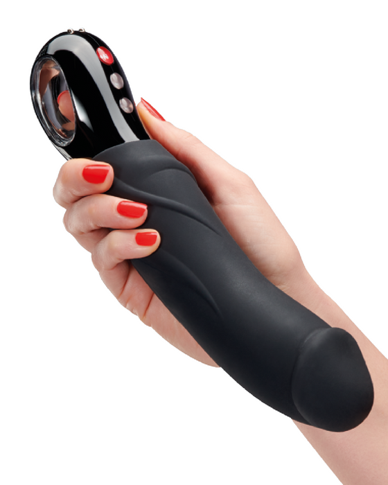 Fun Factory Big Boss Thick Vibrator - Black Line held in a hand