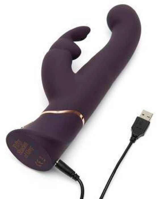 Fifty Shades Of Grey Greedy Girl Stroking Motion G-spot Vibrator laying down showing charging cable 