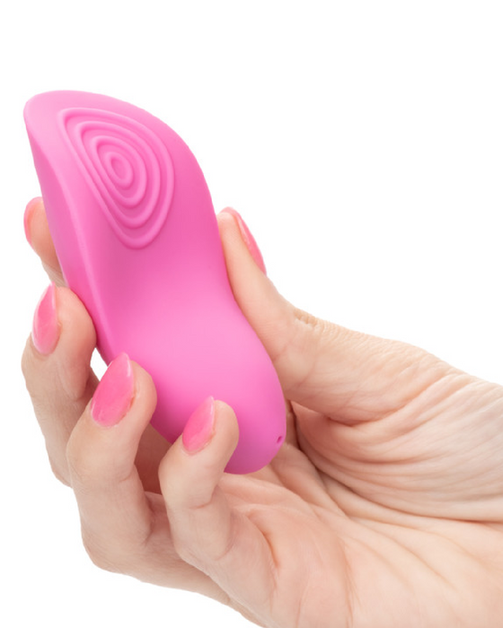 LuvMor Teases Beginner Palm Vibrator in model's hand 