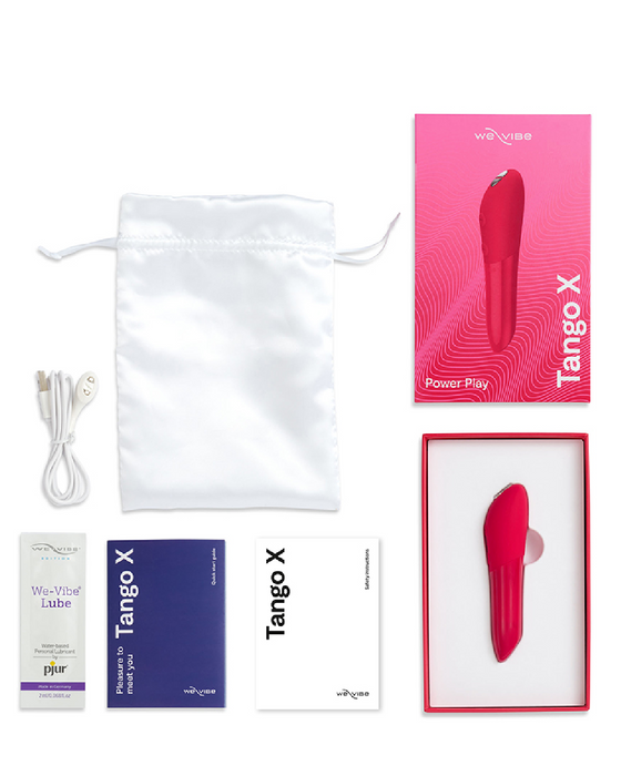 We-Vibe Tango X Powerful Bullet Vibrator - Cherry Red with the package and its contents - cord, storage bag, lube and manual