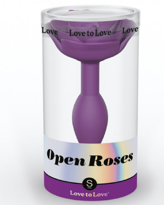 Open Roses Small Silicone Anal Plug - Purple in clear plastic product box 