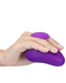 A hand gripping a purple, ergonomic Blush Wellness Palm Sense Vibrator with Finger Hold stress relief squeeze toy with a Rumble Tech™ motor against a white background.