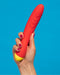 Romp Hype Silicone G-Spot Vibrator against a blue background showing the curve