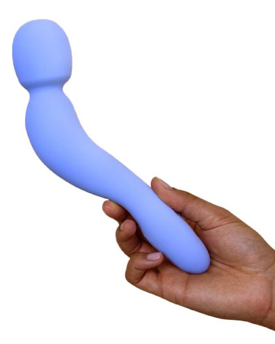 Dame Com Wand Vibrator - Periwinkle in model's hand 