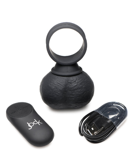 Jock Vibrating Silicone Balls with Remote L - Black next to cable and remote 