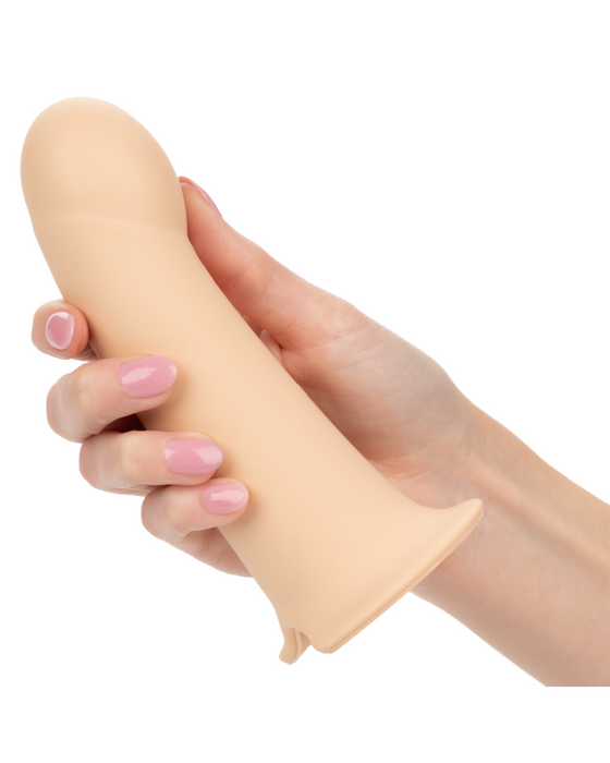 Performance Maxx Smooth Hollow Dildo Silicone Strap-on Penis Extension (Light) held in hand