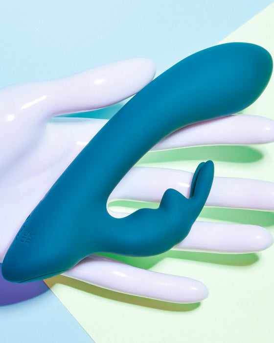Playboy Little Rabbit Silicone Vibrator in mannequin's hand 