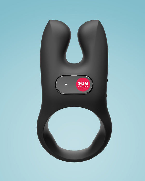 Fun Factory NŌS Vibrating Couples Penis Ring - Black against a blue background