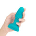 Hand holding B-Vibe Silicone Rechargeable Rimming Butt Plug Petite  teal