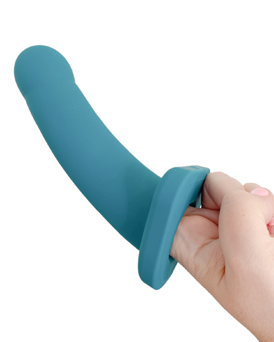 Nexus Lennox 8 Inch Hollow Vibrating Silicone Sheath Dildo - Emerald with 2 fingers in the hollow shaft